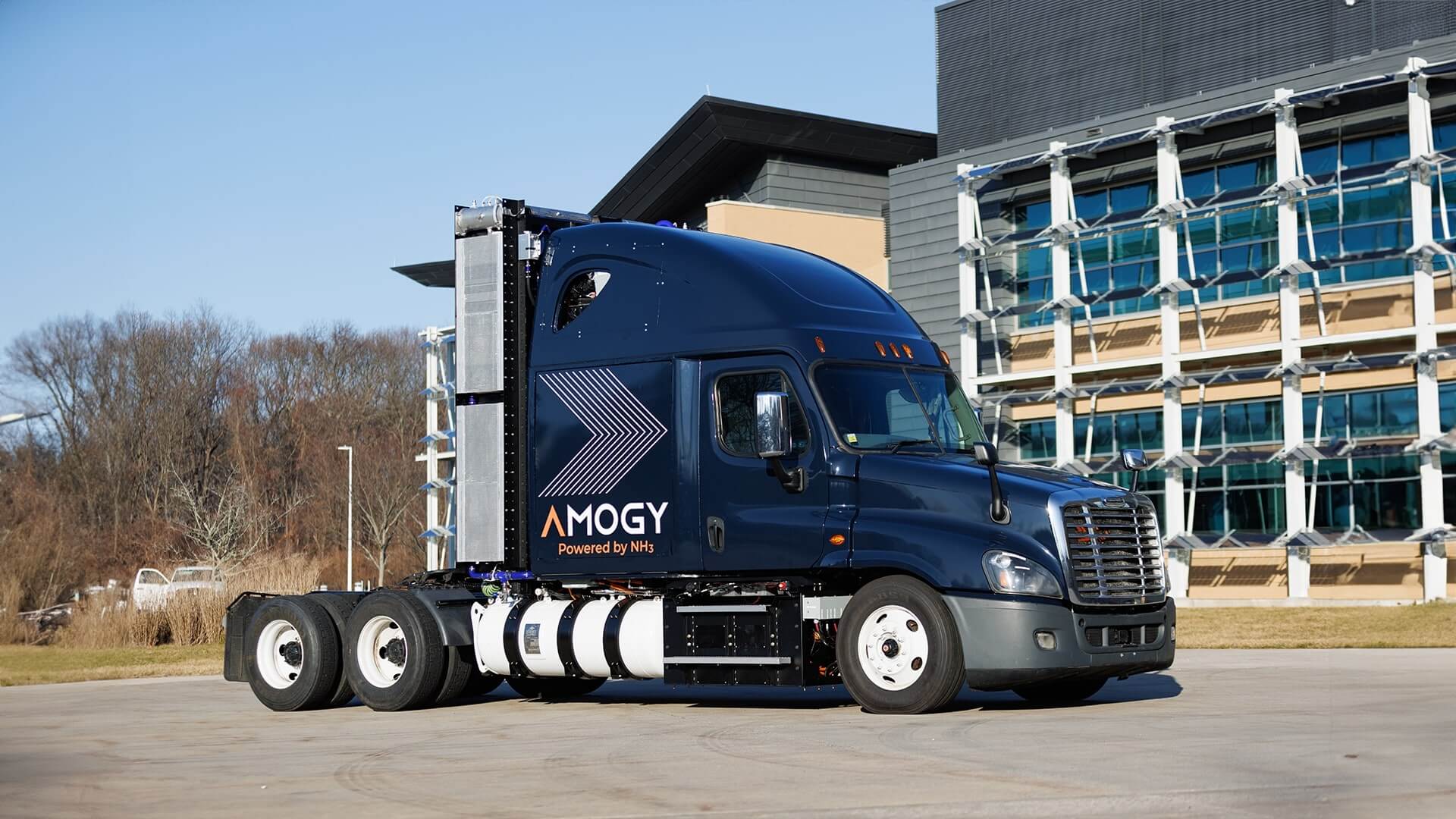 Amogy truck outside an office building